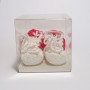 White and pink baby shoes
