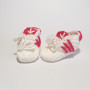 White and pink baby shoes