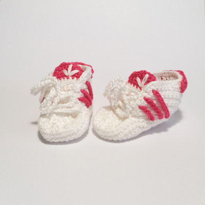 White and pink baby shoes