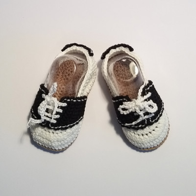 White and black baby shoes