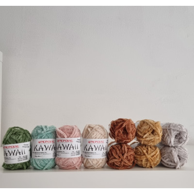 10 gomitoli Kawaii toni neutri e verde
