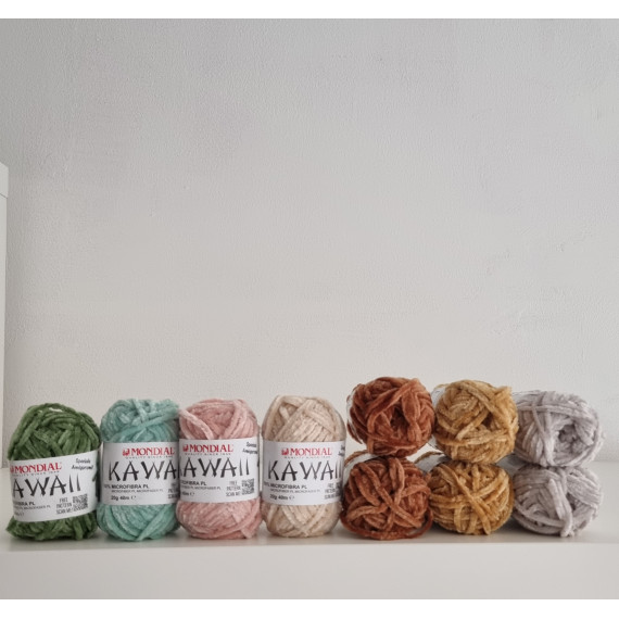 10 gomitoli Kawaii toni neutri e verde